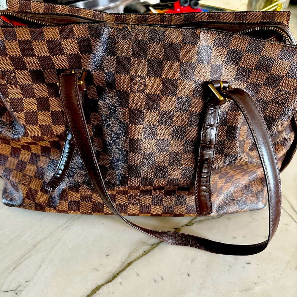 Louis Vuitton Chelsea crafted in Damier Ebene check coated canvas